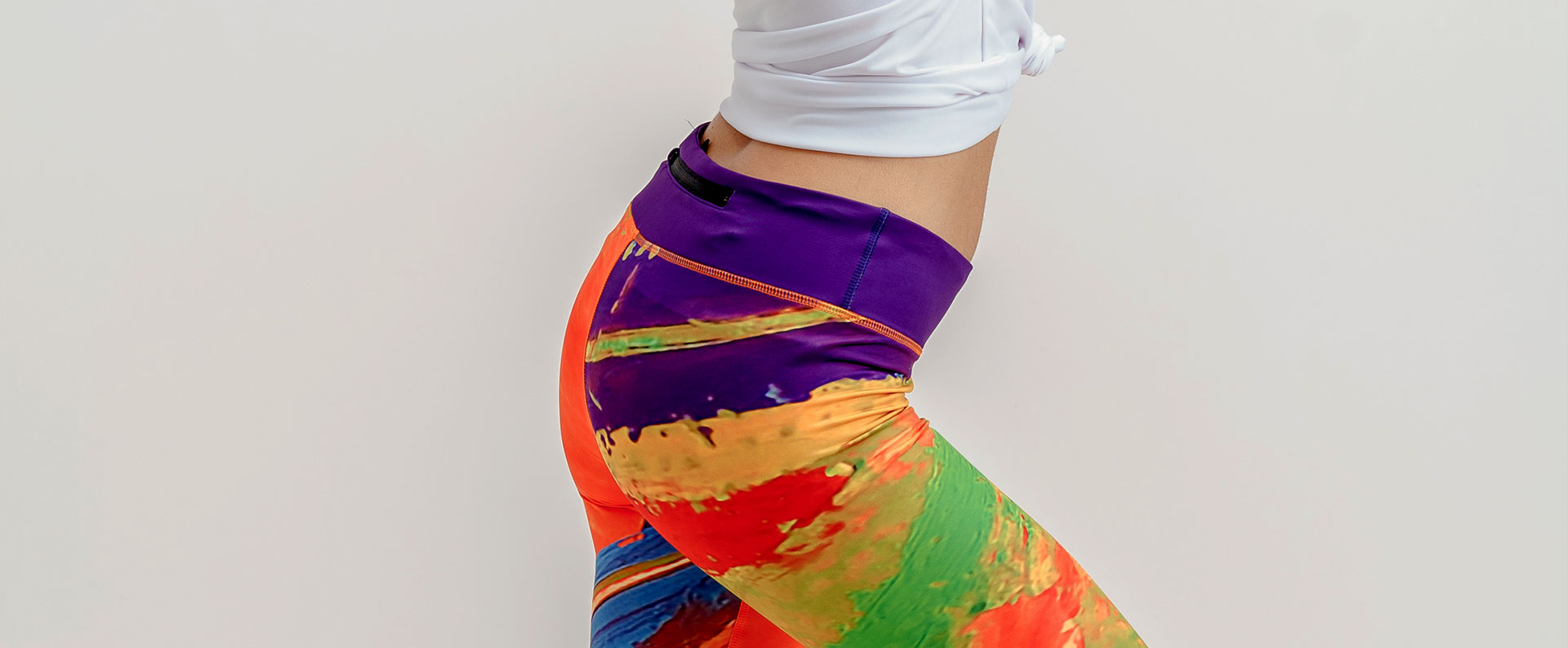 Kolorowe legginsy do biegania z kieszonką RICE FIELDS